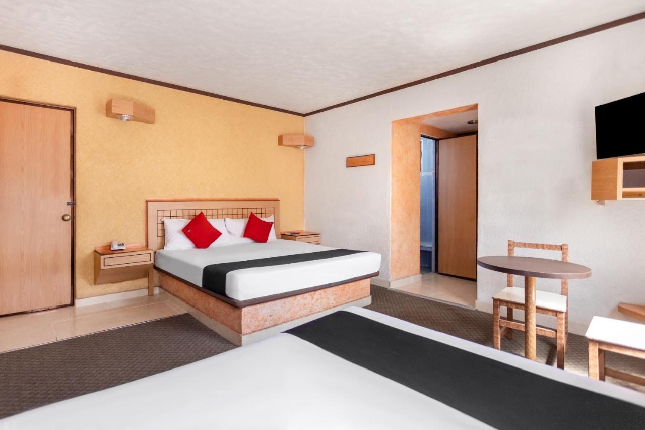 Capital O Hotel Valencia Пуэбла Экстерьер фото