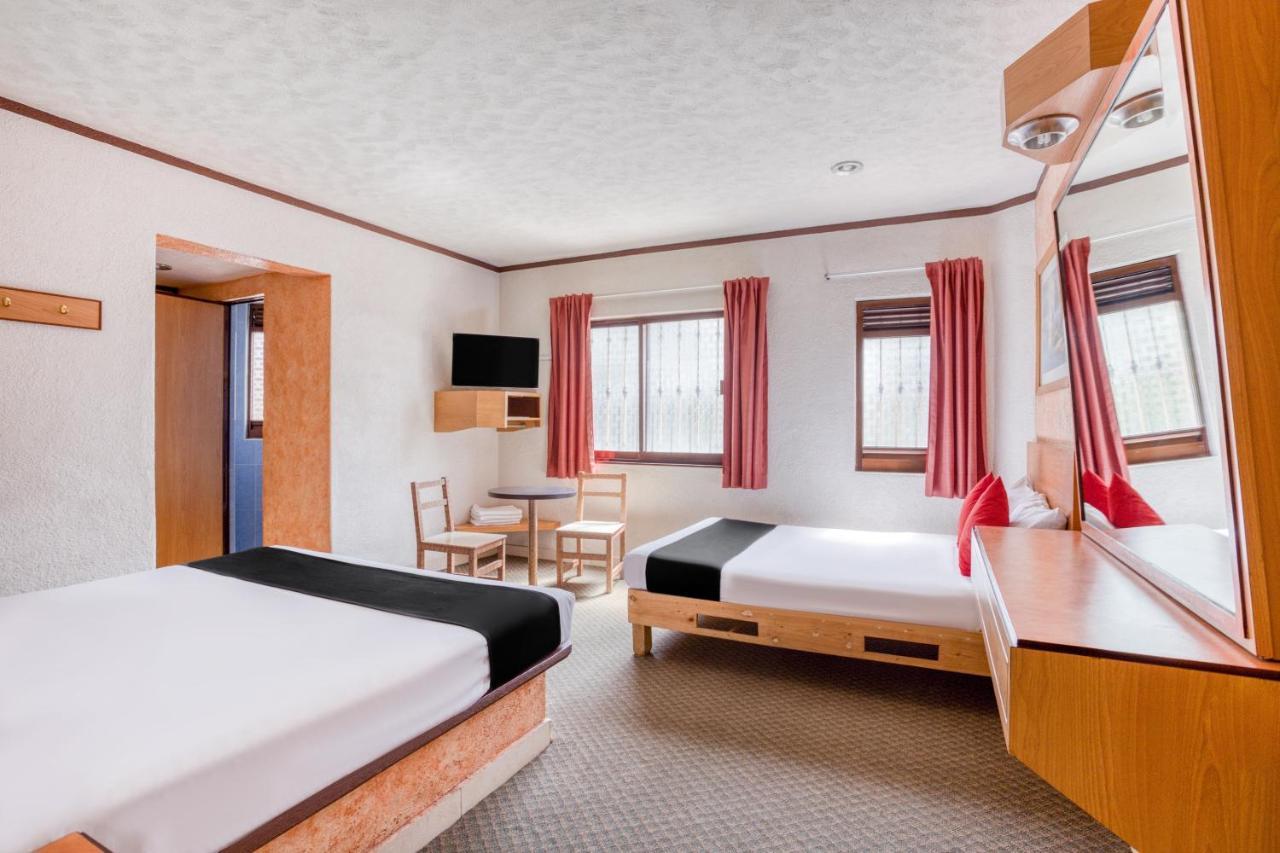 Capital O Hotel Valencia Пуэбла Экстерьер фото