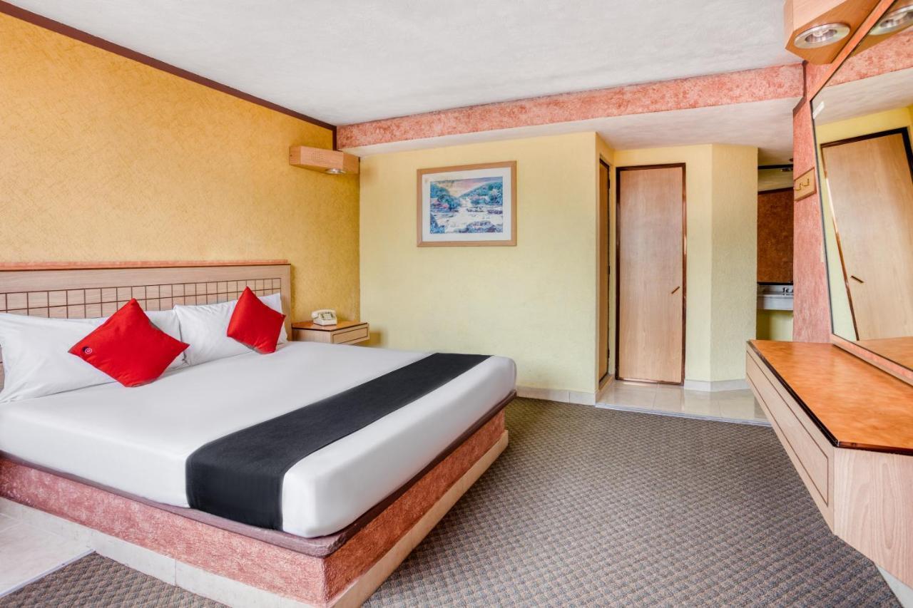 Capital O Hotel Valencia Пуэбла Экстерьер фото