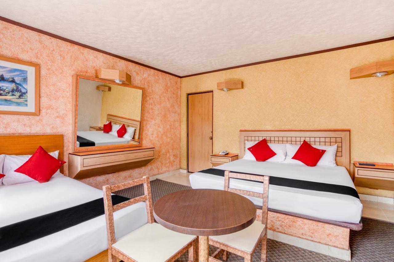 Capital O Hotel Valencia Пуэбла Экстерьер фото